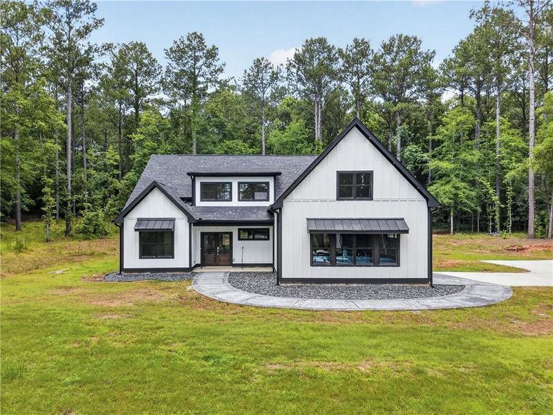 Front exterior of a new home in , Buckhead, GA, highlighting curb appeal (Image 29). Front exterior of a new home in , Buckhead, GA, highlighting curb appeal (Image 29).
