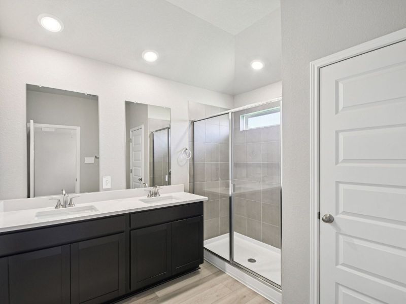 Furnished interior view inside a new home in Riverbend at Double Eagle - Boulevard Collection, Cedar Creek (Image 3).