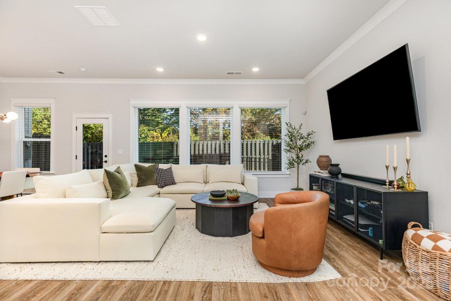 Huge windows across the back bring in tons of natural light and views of nature.