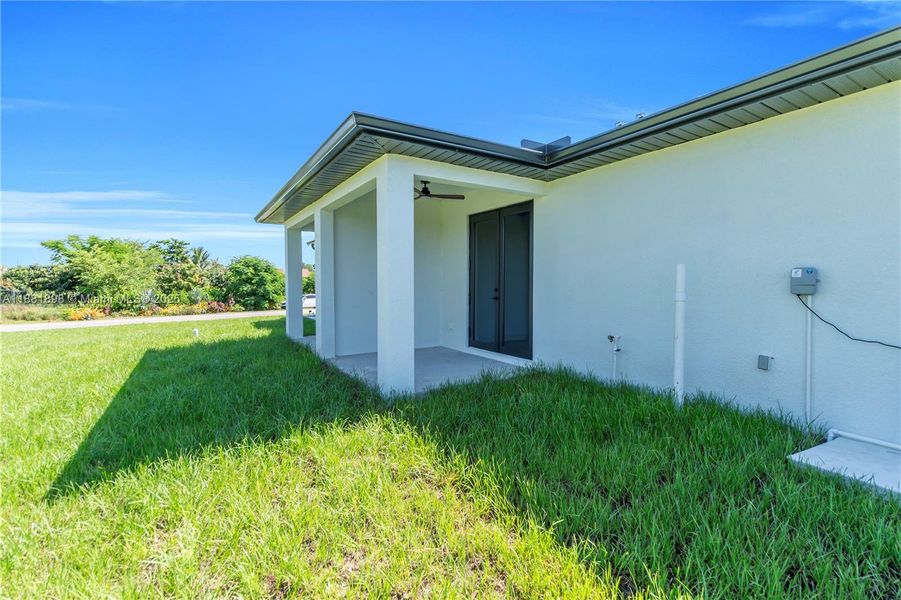 Front exterior of a new home in , Lehigh Acres, FL, highlighting curb appeal (Image 23).