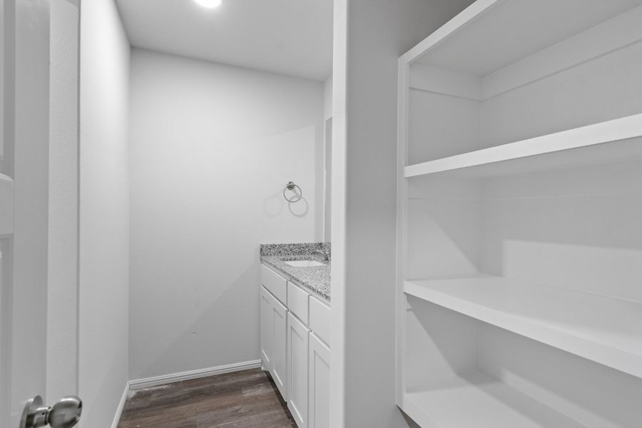 Representative furnished interior of a home built from the TAYLOR by D.R. Horton in Faculty Row, Abilene (Image 29).