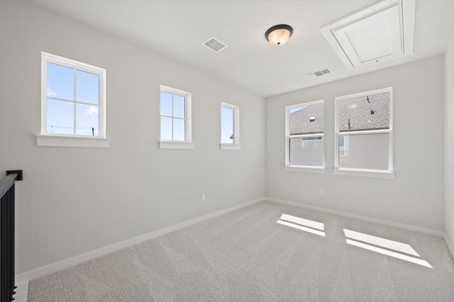 Spacious, unfurnished interior of a new home in Terrace Collection At Turner's Crossing, Buda (Image 33).