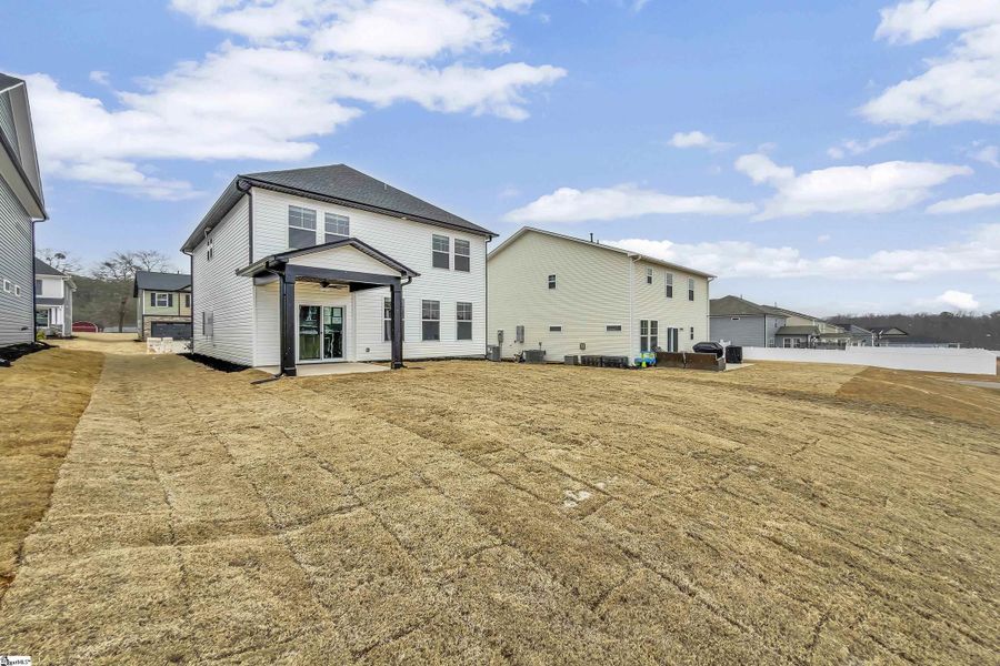 Exterior details and patio area of a home in Sedona, Greenville (Image 3).