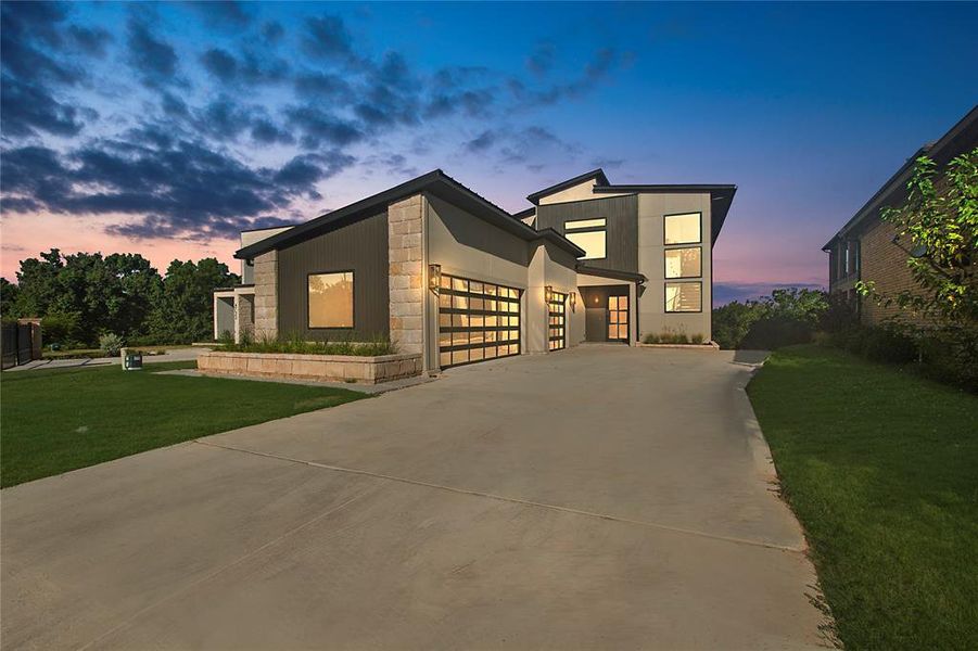 Contemporary home featuring a yard