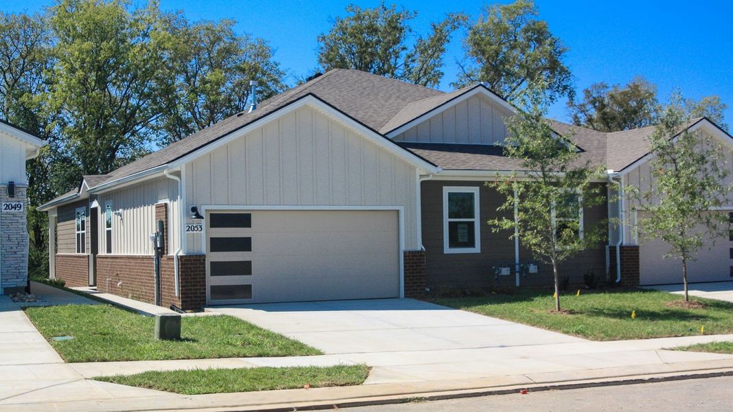 Front exterior of a new home in Nexus South, Gallatin, TN, highlighting curb appeal (Image 23).