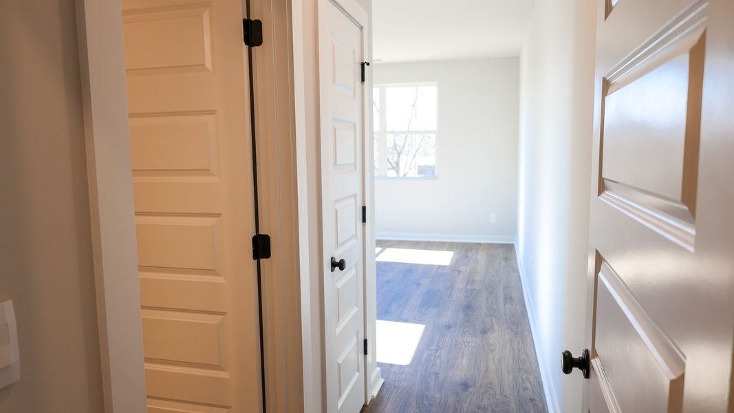 Representative unfurnished interior of a home built from the STONEBROOK II by D.R. Horton in Harvest Point, Spring Hill (Image 41).