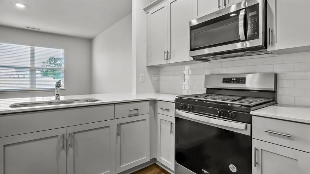 Furnished interior view inside a new home in Clock Road Townhomes, New Bern (Image 6).
