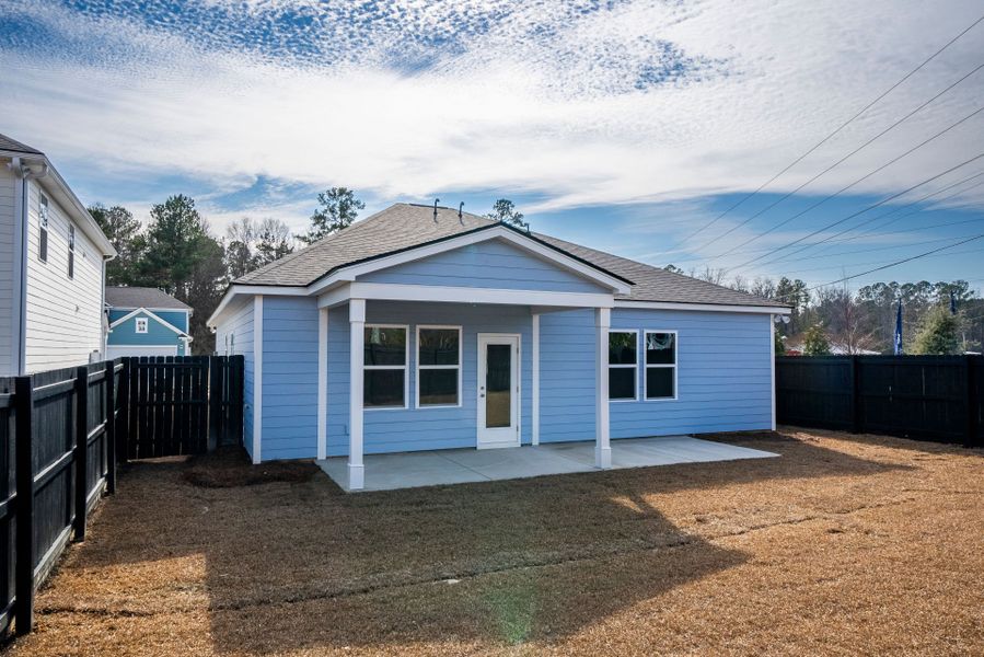 Exterior details and patio area of a home in Monroe Preserve, Chapin (Image 33).