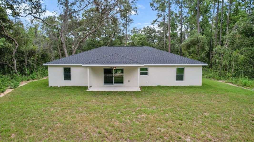 Front exterior of a new home in , Dunnellon, FL, highlighting curb appeal (Image 19).