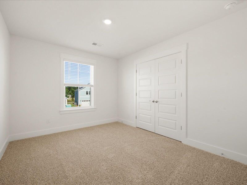 Spacious, unfurnished interior of a new home in The Coves at Lakes of Cane Bay II, Summerville (Image 21). Spacious, unfurnished interior of a new home in The Coves at Lakes of Cane Bay II, Summerville (Image 21).