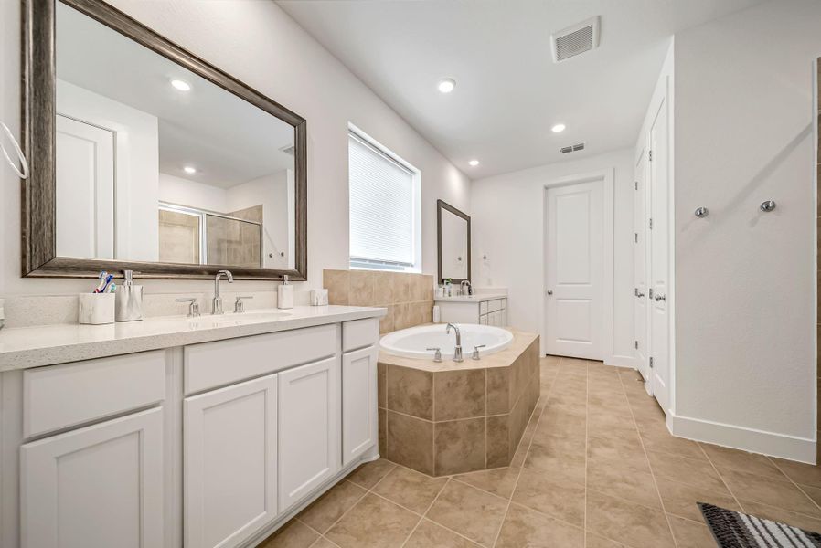 Spa-Like Primary Double Sink Bath Oasis with Custom Finishes & Soaking Tub. Separate Shower. Spa-Like Primary Double Sink Bath Oasis with Custom Finishes & Soaking Tub. Separate Shower.