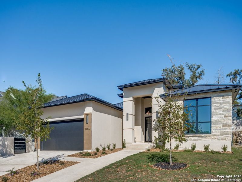 Front exterior of a new home in , San Antonio, TX, highlighting curb appeal (Image 1).