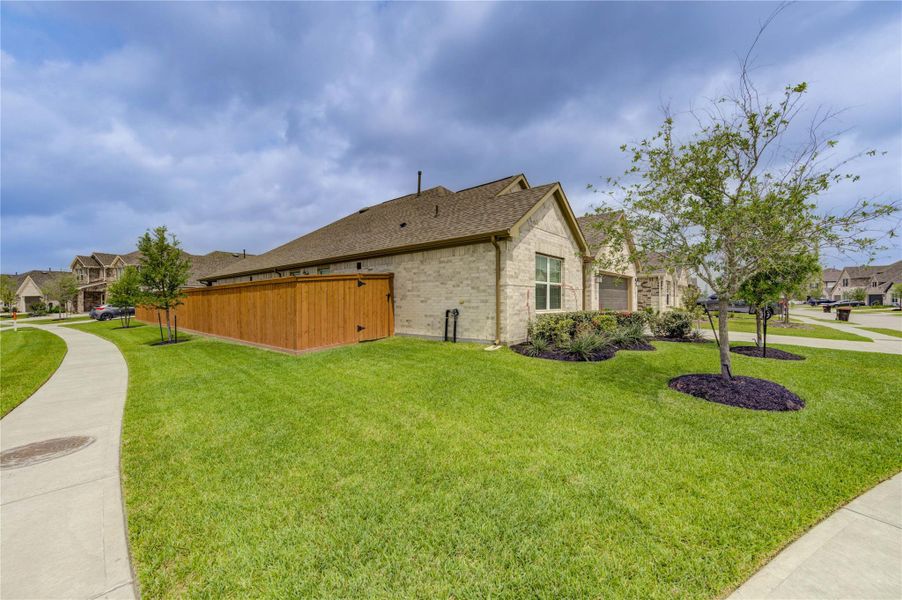 Exterior details and patio area of a home in Marvida, Cypress (Image 3).