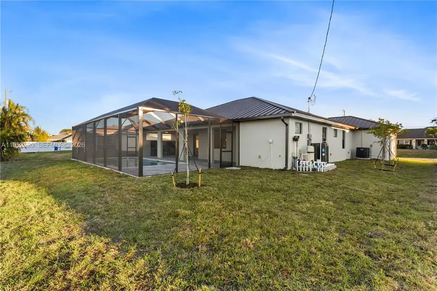 Exterior details and patio area of a home in , Cape Coral (Image 3).