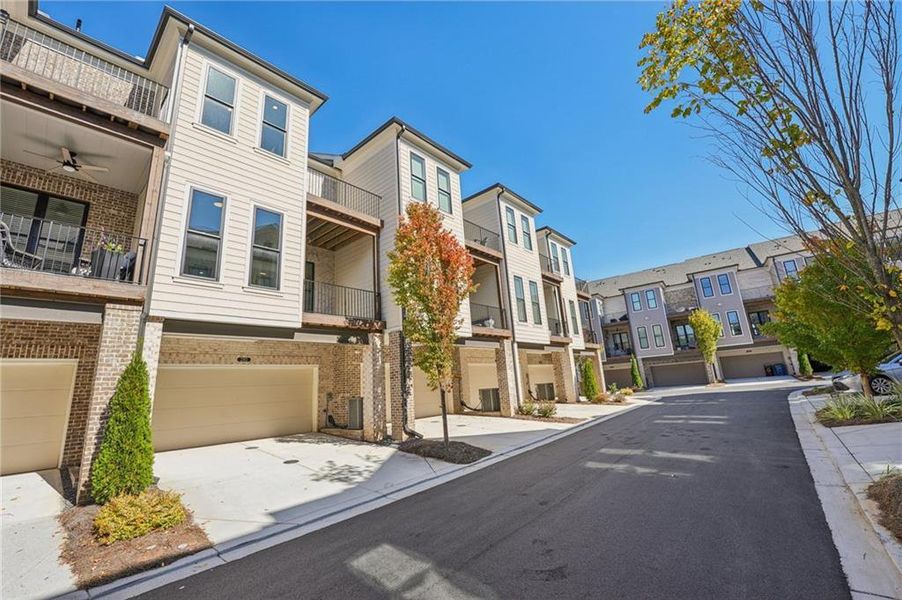 Front exterior of a new home in Towns on Thompson, Alpharetta, GA, highlighting curb appeal (Image 25).