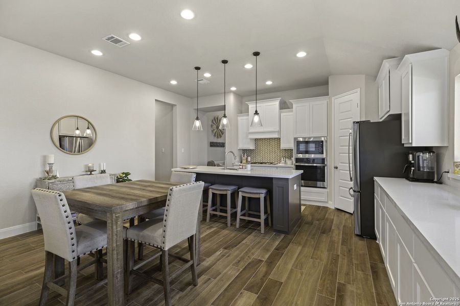 Furnished interior view inside a new home in The Village of Mill Creek 50', Seguin (Image 3).