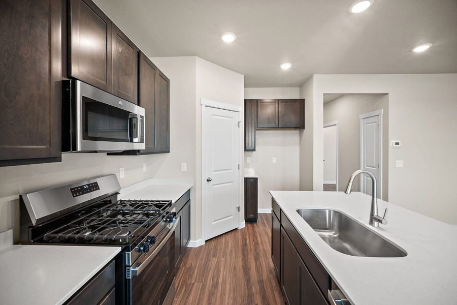 Furnished interior view inside a new home in Ridge at Lorson Ranch, Colorado Springs (Image 8).