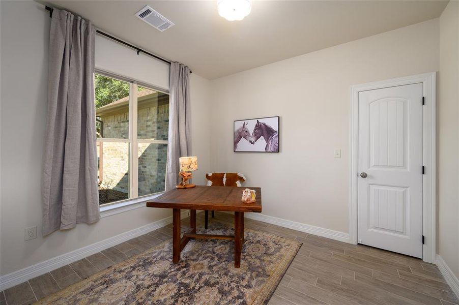 Home office featuring light wood-type flooring