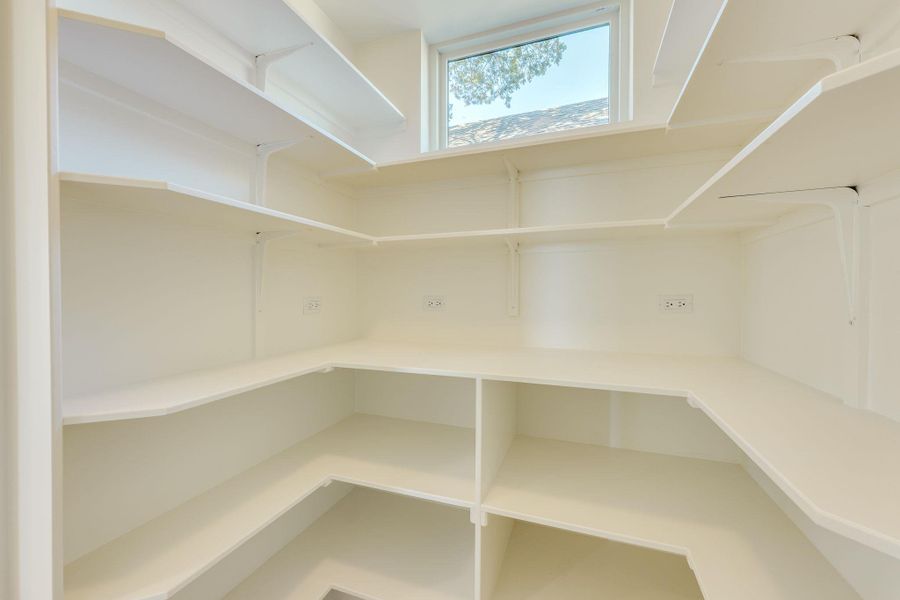 Pantry and appliance garage located in the kitchen.