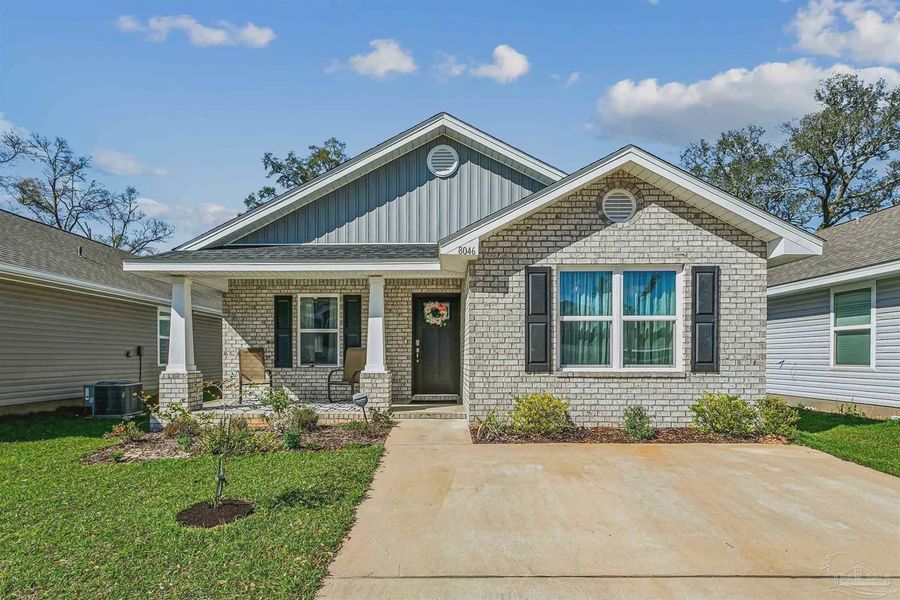 Front exterior of a new home in Westpointe Place, Pensacola, FL, highlighting curb appeal (Image 2). Front exterior of a new home in Westpointe Place, Pensacola, FL, highlighting curb appeal (Image 2).
