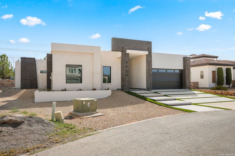 Front exterior of a new home in , El Paso, TX, highlighting curb appeal (Image 25).