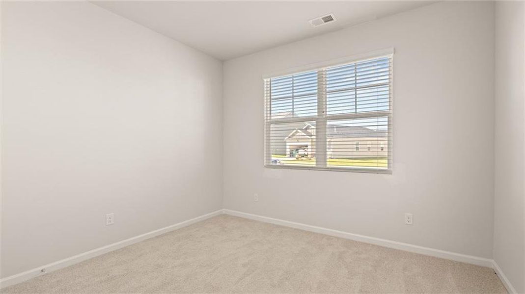 Spacious, unfurnished interior of a new home in The Preserve at Agricultural Village, Perry (Image 23).