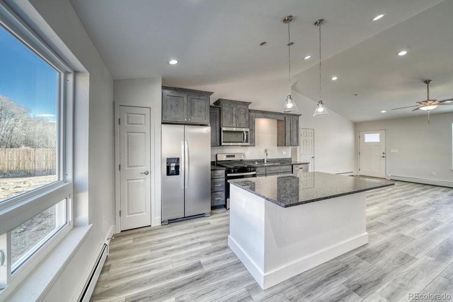 Kitchen Island with granite countertops throughout home Kitchen Island with granite countertops throughout home