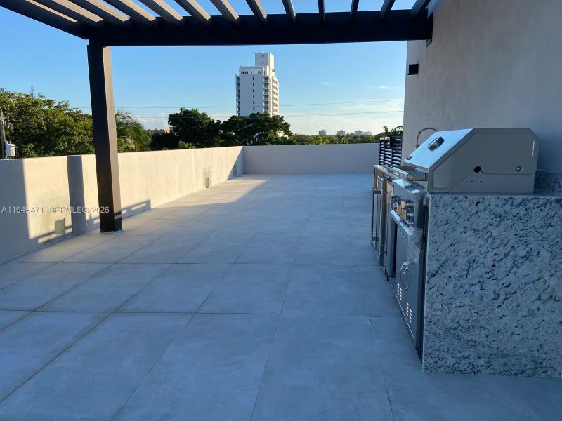 Exterior details and patio area of a home in , Miami (Image 14).