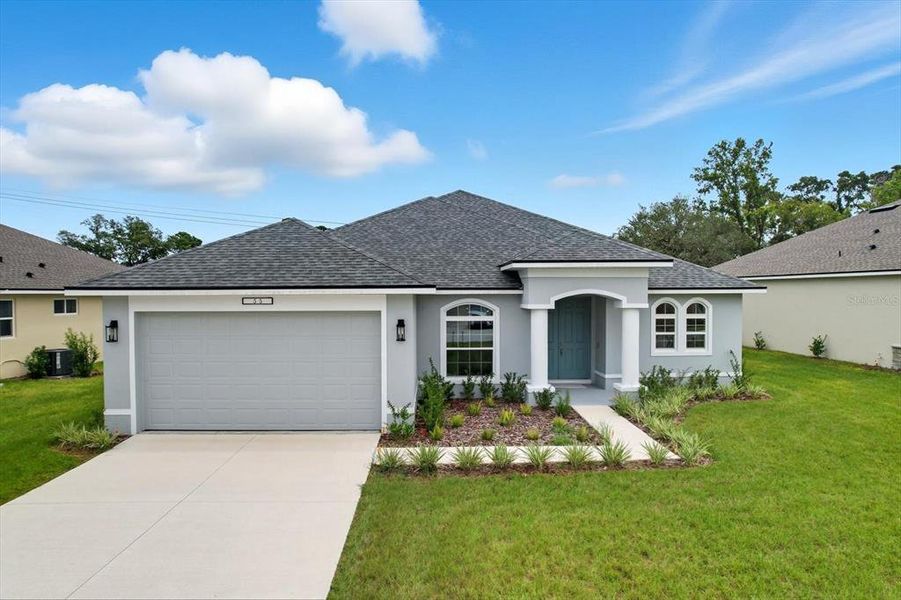 Front exterior of a new home in , Homosassa, FL, highlighting curb appeal (Image 21).