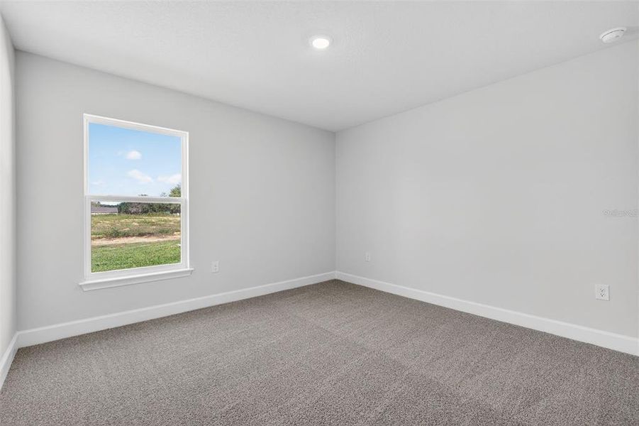Spacious, unfurnished interior of a new home in Hill Country Estates, Dade City (Image 31).