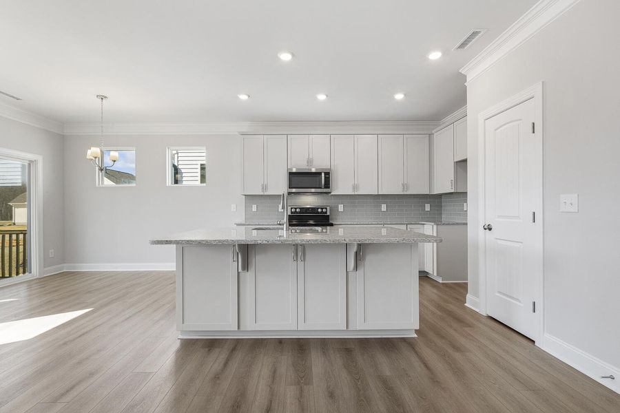 Furnished interior view inside a new home in 1158 Place, Wilson (Image 7).