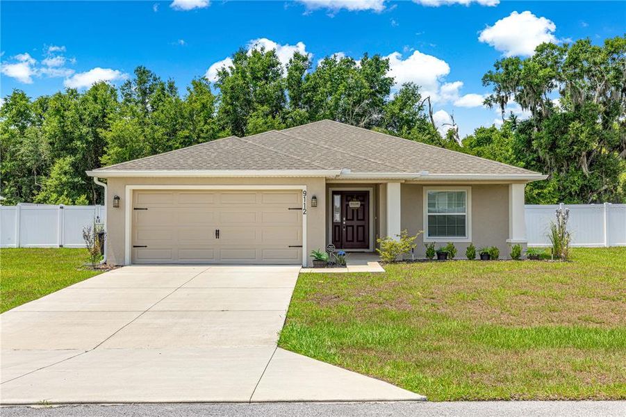 Front exterior of a new home in , Ocala, FL, highlighting curb appeal (Image 24). Front exterior of a new home in , Ocala, FL, highlighting curb appeal (Image 24).