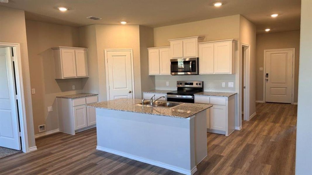 Kitchen - All Home and community information, including pricing, included features, terms, availability and amenities, are subject to change at any time without notice or obligation. All Drawings, pictures, photographs, video, square footages, floor plans, elevations, features, colors and sizes are approximate for illustration purposes only and will vary from the homes as built.
