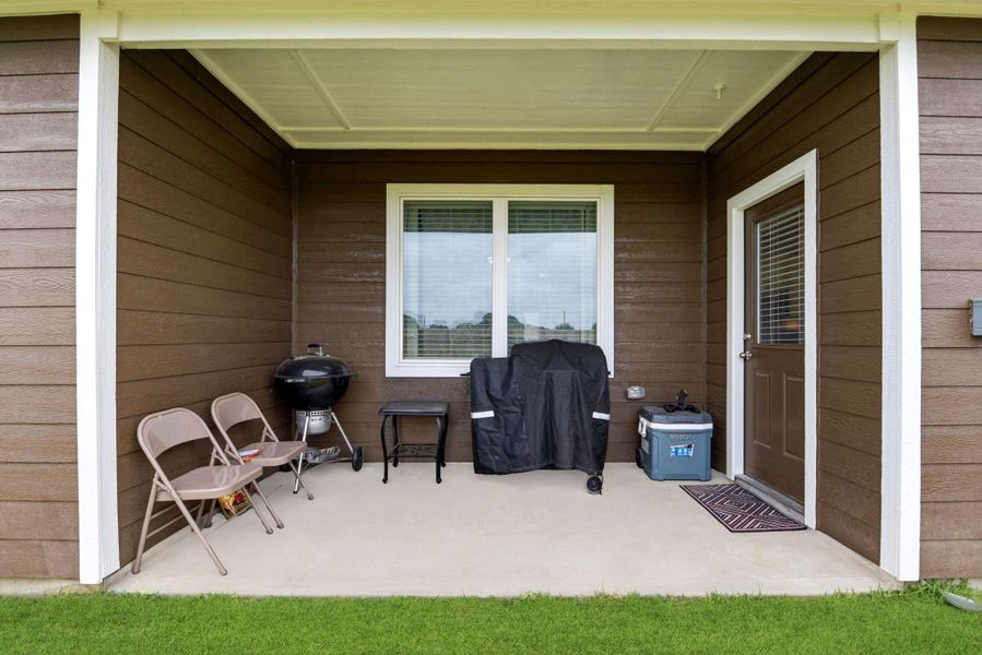 Exterior details and patio area of a home in Vacek Country Meadows, Richmond (Image 4).