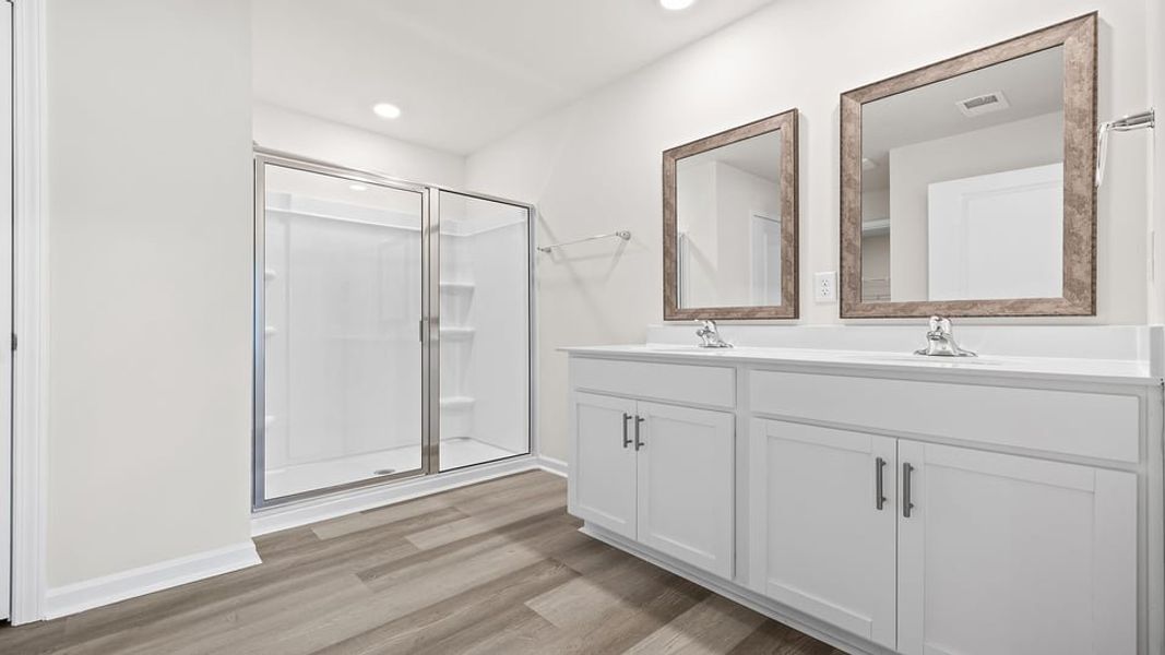 Furnished interior view inside a new home in Lakestone, Woodruff (Image 9).