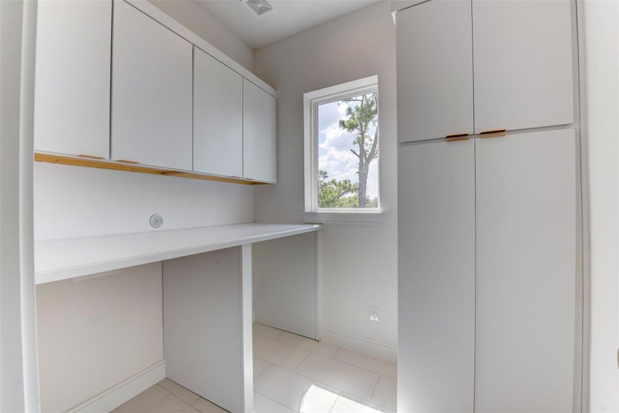 Large utility room on the third floor.