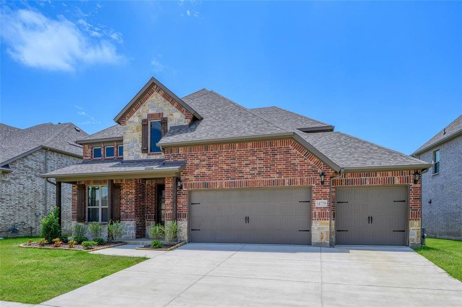 Front exterior of a new home in Creekview Meadows, Pilot Point, TX, highlighting curb appeal (Image 2). Front exterior of a new home in Creekview Meadows, Pilot Point, TX, highlighting curb appeal (Image 2).