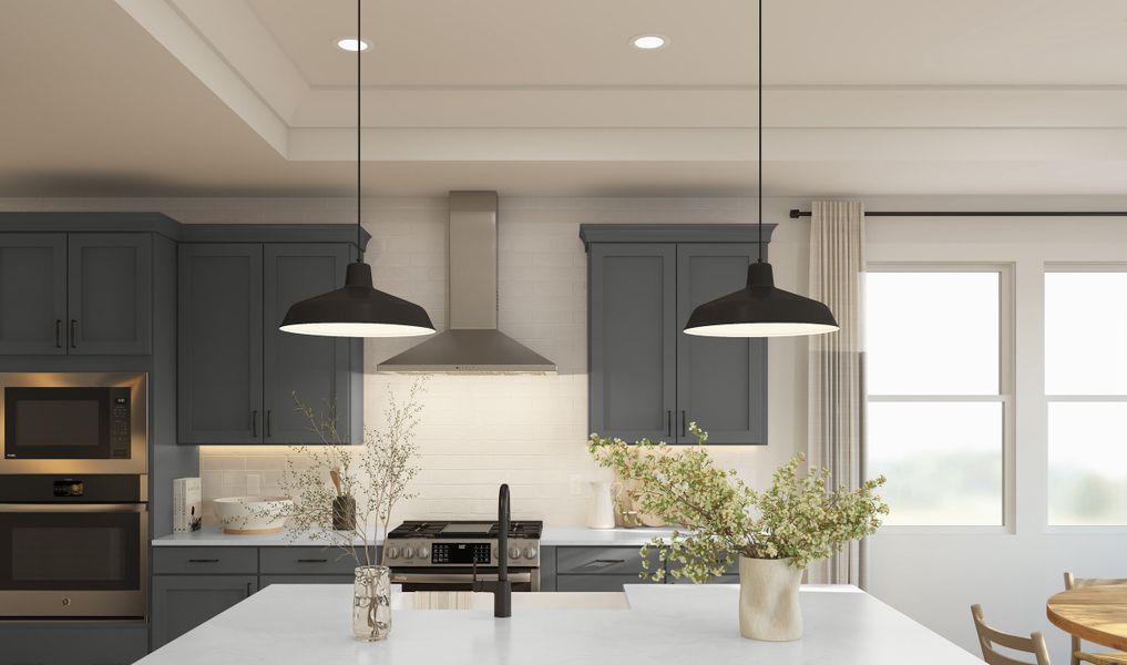 Kitchen with tray ceiling and crown moulding