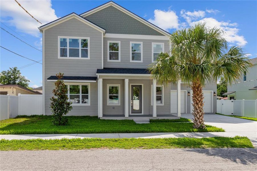 Front exterior of a new home in , Tampa, FL, highlighting curb appeal (Image 1). Front exterior of a new home in , Tampa, FL, highlighting curb appeal (Image 1).