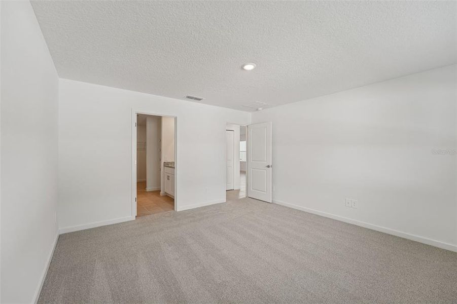 Spacious, unfurnished interior of a new home in Flagler Village - Classic Series, Palm Coast (Image 22). Spacious, unfurnished interior of a new home in Flagler Village - Classic Series, Palm Coast (Image 22).