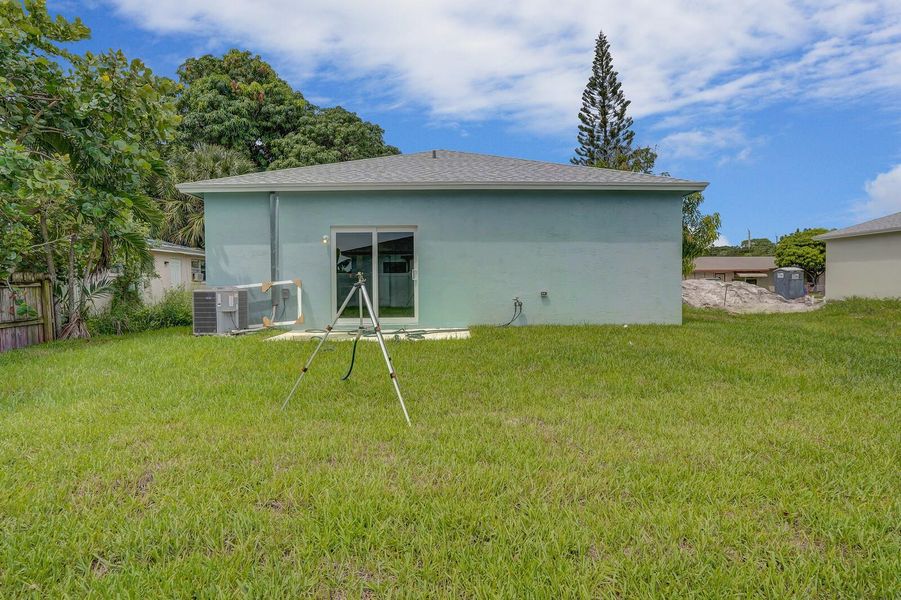 Front exterior of a new home in , Lantana, FL, highlighting curb appeal (Image 15). Front exterior of a new home in , Lantana, FL, highlighting curb appeal (Image 15).