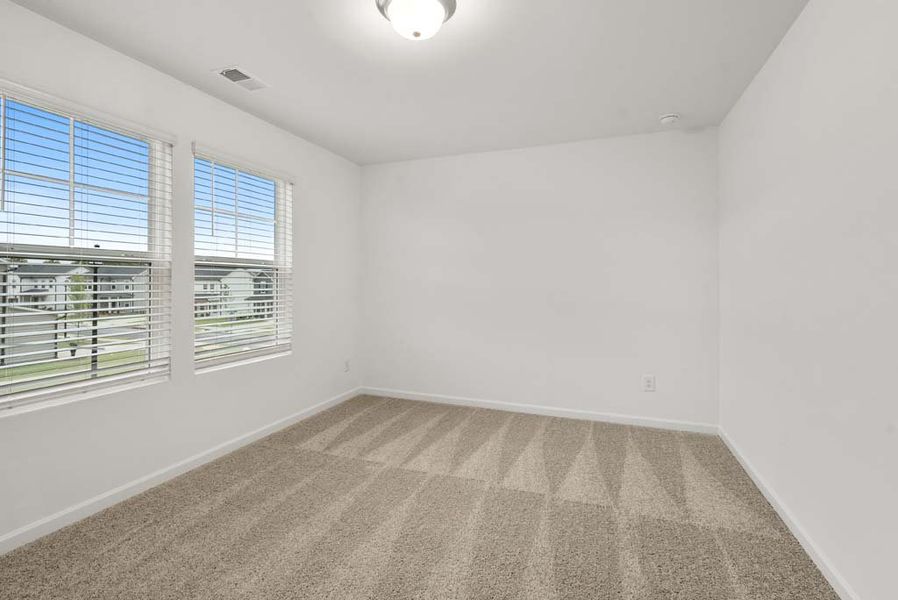 Representative unfurnished interior of a home built from the Baker by Ashton Woods in Langston Reserve, Cartersville (Image 28).