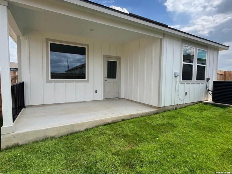 Exterior details and patio area of a home in Highland Ridge, New Braunfels (Image 3).