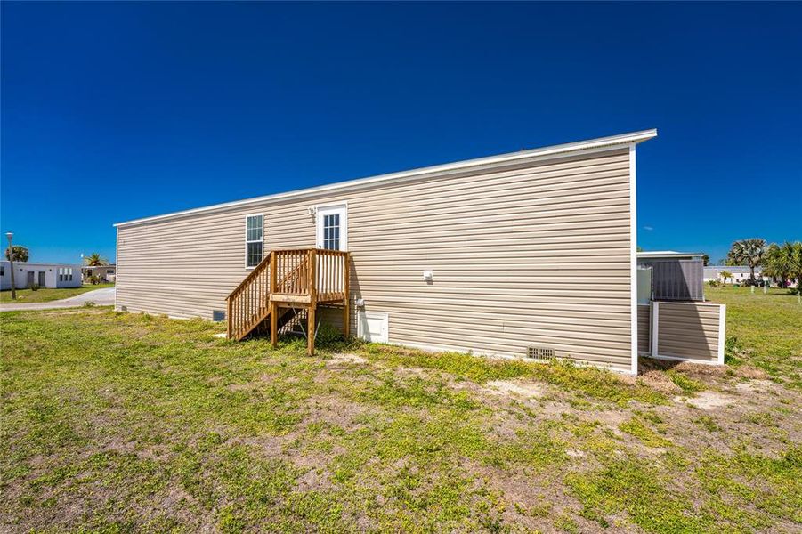 Exterior details and patio area of a home in , Port Charlotte (Image 18).