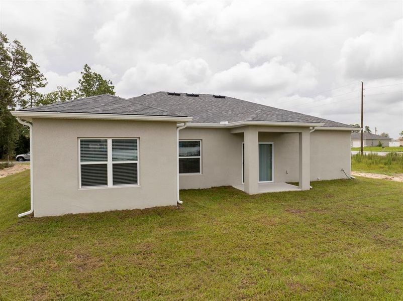 Exterior details and patio area of a home in , Ocala (Image 32).