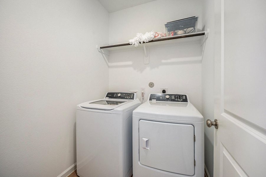 Dedicated laundry space located just off the front entry. Dedicated laundry space located just off the front entry.