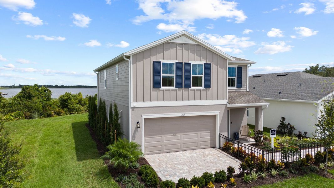 Representative exterior photo of a completed home built from the Ponte Verde by DRB Homes in Willowbrook North, Winter Haven, FL (Image 31). Representative exterior photo of a completed home built from the Ponte Verde by DRB Homes in Willowbrook North, Winter Haven, FL (Image 31).