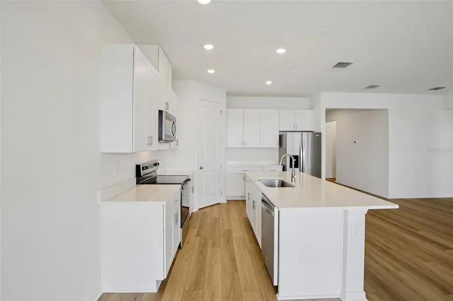 Furnished interior view inside a new home in Coasterra - Reserve Series, Palmetto (Image 11).