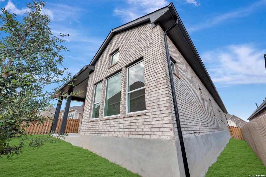Exterior details and patio area of a home in Windsong - Reserve Series, Boerne (Image 22). Exterior details and patio area of a home in Windsong - Reserve Series, Boerne (Image 22).