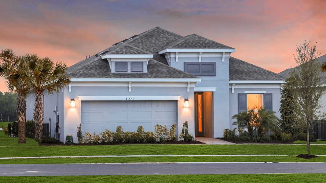 Representative exterior photo of a completed home built from the Lazio by Taylor Morrison in Esplanade at Westview, Kissimmee, FL (Image 2).